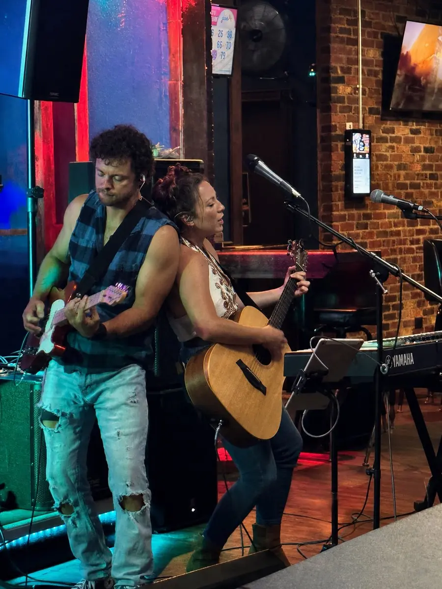 Heath and Andrea performing back to back