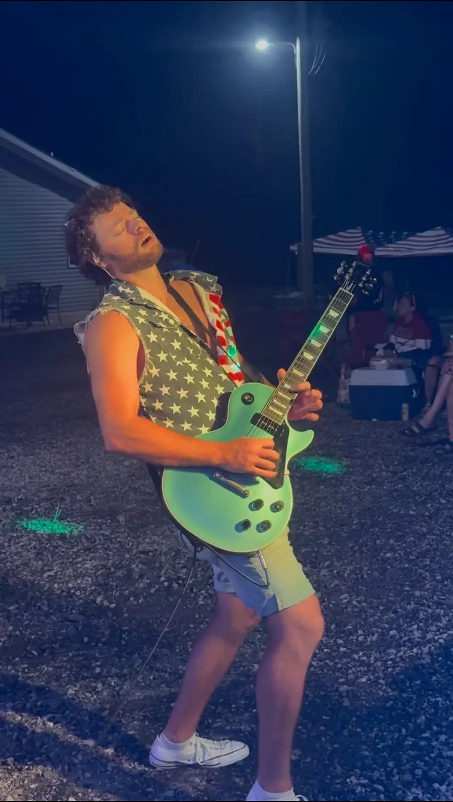 Heath playing guitar